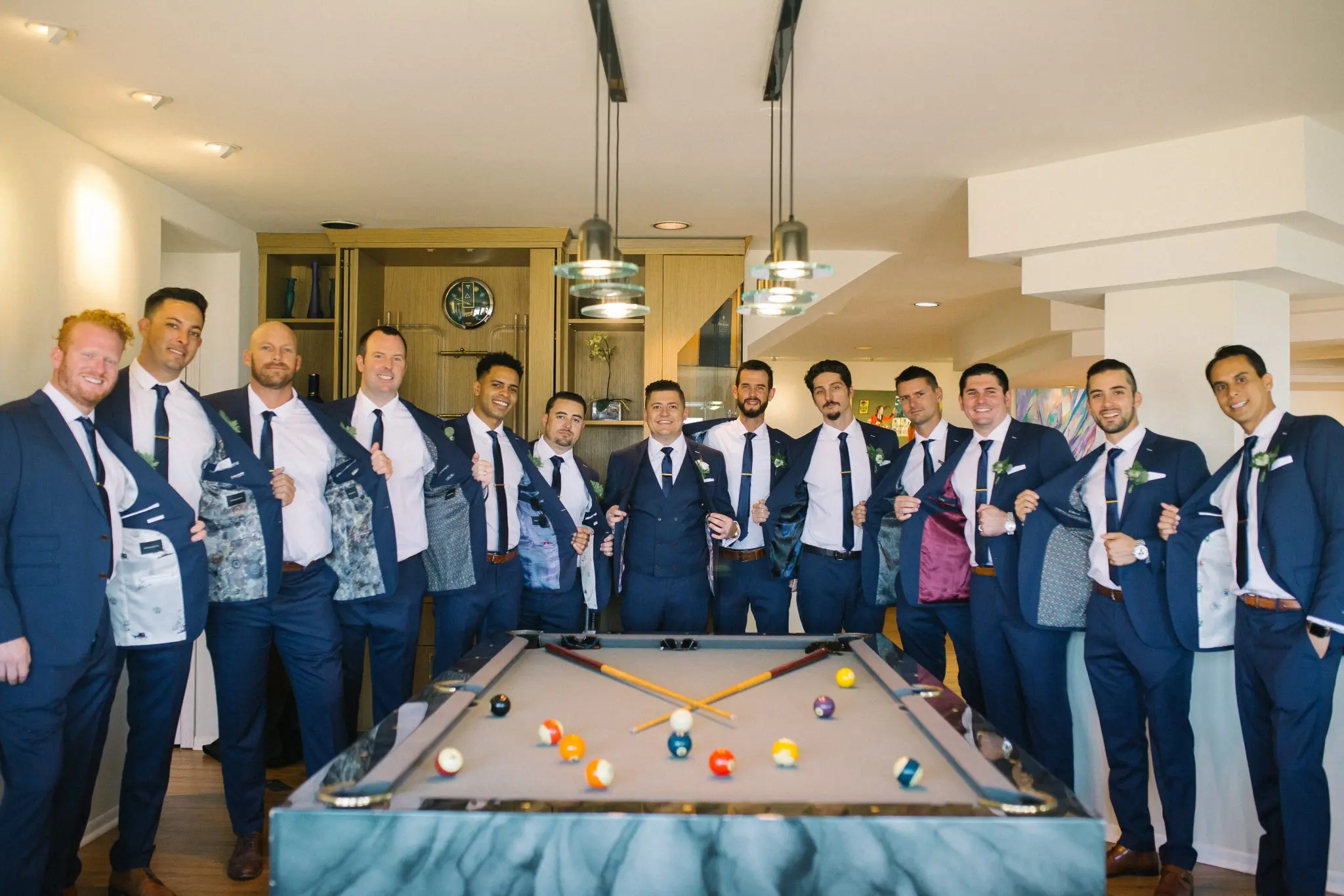 Groomsmen in custom tailored suits